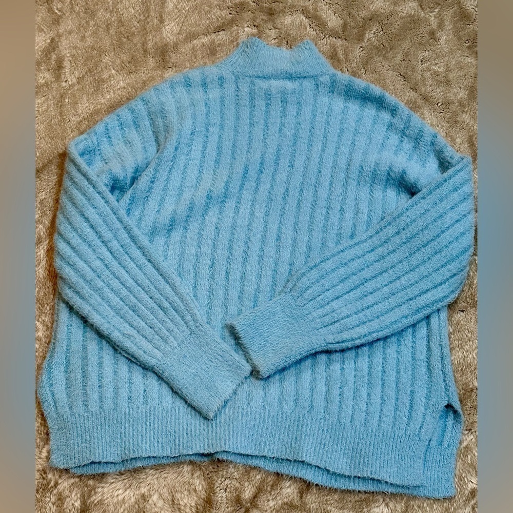 Feels gloriously soft! Size medium robin’s egg blue sweater oversized​​​​​​​